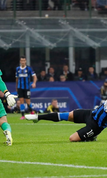Inter beats Dortmund 2-0 for 1st CL win this season